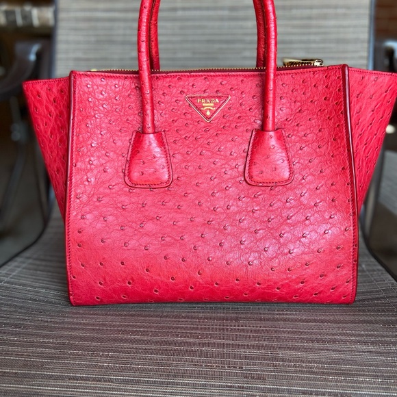 Prada Handbags - Prada GORGEOUS Ostrich leather coral  handbag , gold tone hardware